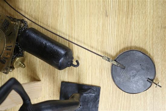 A lantern style wall clock